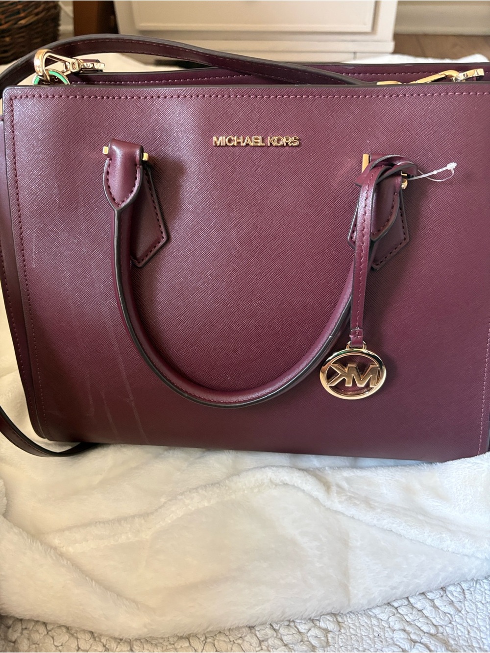 Michael Kors Burgandy Saffiano Leather Satchel Handbag with Gold Hardware.